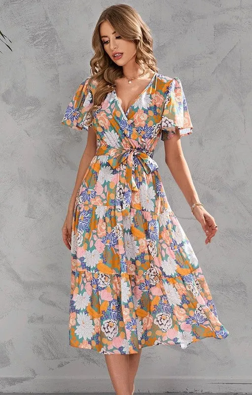 V-neck floral tiered midi dress sold by Charming Charlie