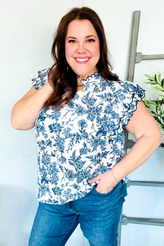 Vintage Vibes Navy/Ivory Embroidered Ruffle Sleeve Notch Neck Top sold by Charming Charlie