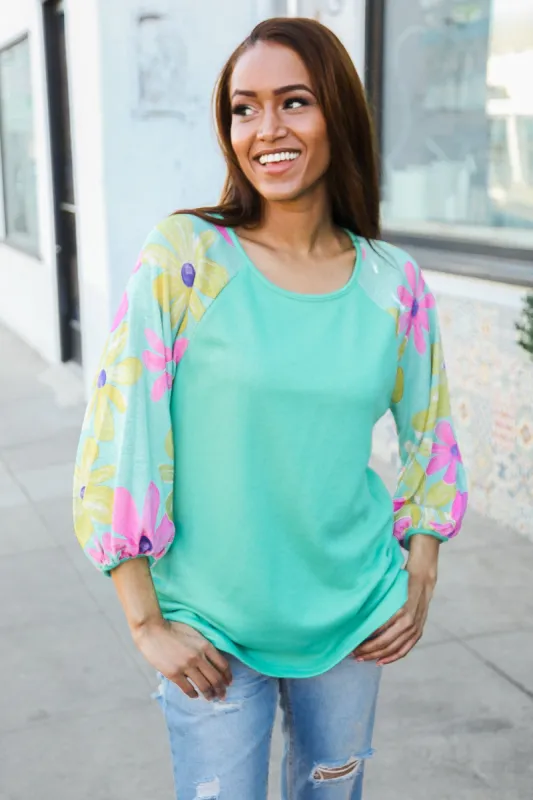 Flower Power Mint French Terry Floral Print Colorblock Pullover sold by Charming Charlie
