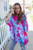 Follow Me Fuchsia Floral Asymmetrical Coverup Blouse sold by Charming Charlie