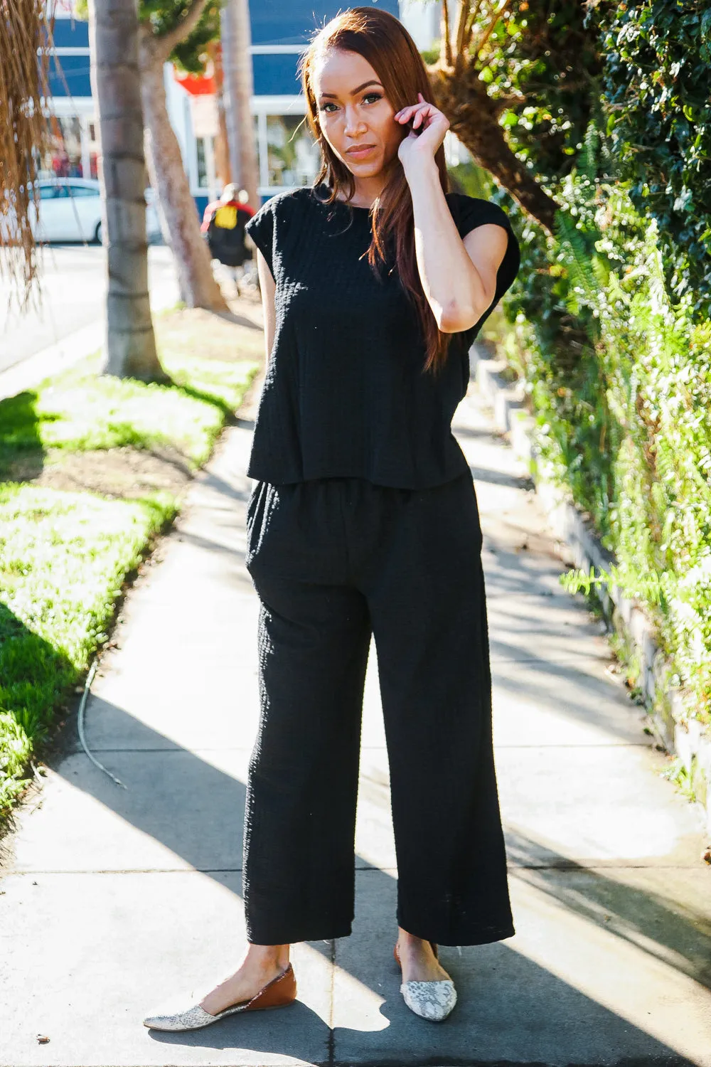 Stand Out Black Textured Shirt Attached Crossover Back Pant Suit sold by Charming Charlie product image thumbnail 3
