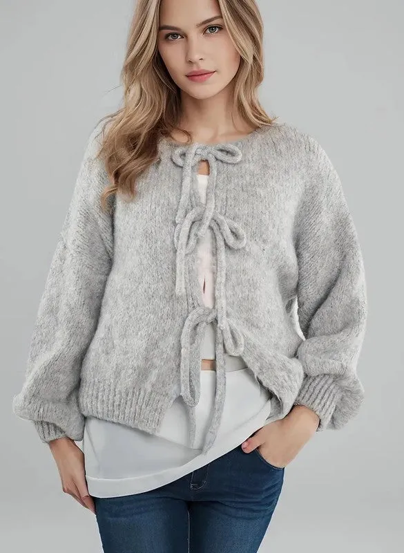 V-neck front tie Cardigan sold by Charming Charlie