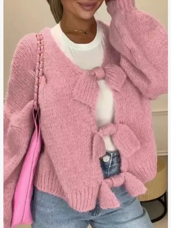 Bow Tie Cardigan sold by Charming Charlie