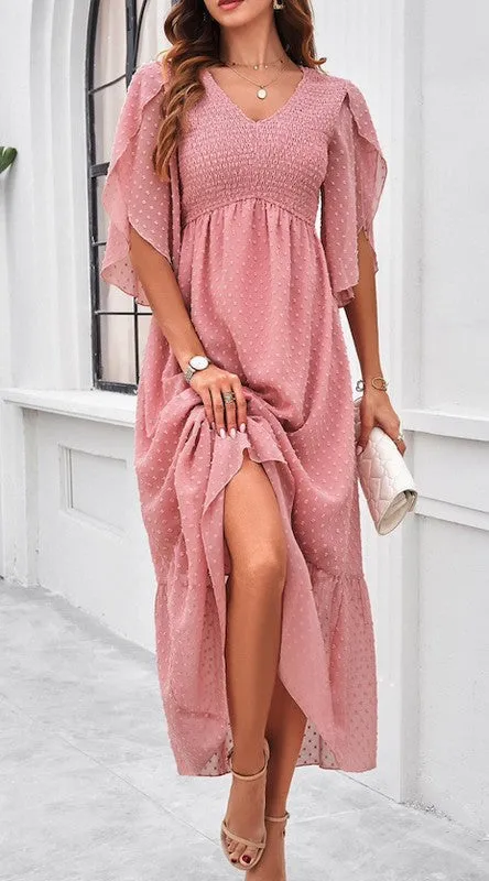 Swiss dot ruffled dress sold by Charming Charlie