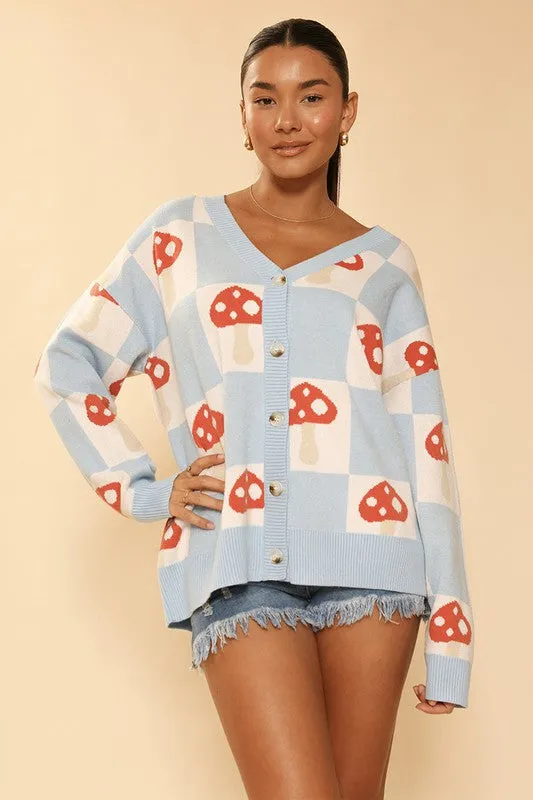 Checkered mushroom knit cardigan sold by Charming Charlie