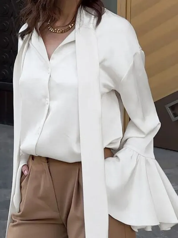 Button Down Flounce Sleeve Shirt sold by Charming Charlie