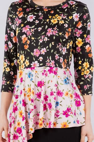 Celeste Full Size Floral Asymmetrical Hemline Round Neck Top Plus Size sold by Charming Charlie product image thumbnail 5