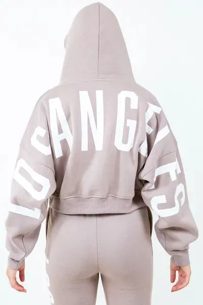 American Bazi Letter Graphic Long Sleeve Drawstring Cropped Hoodie sold by Charming Charlie product image thumbnail 3