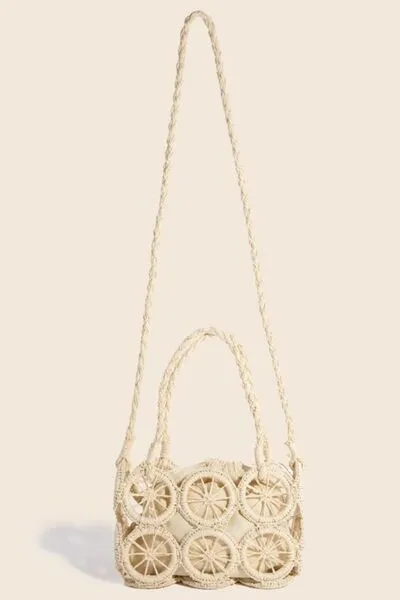 Fame Intricate Braided Wheels Crossbody Bag sold by Charming Charlie
