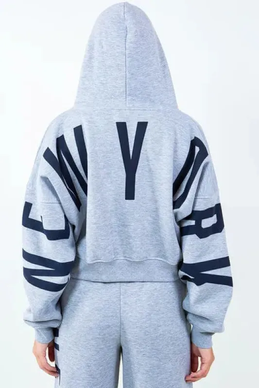 American Bazi Letter Graphic Long Sleeve Drawstring Cropped Hoodie sold by Charming Charlie