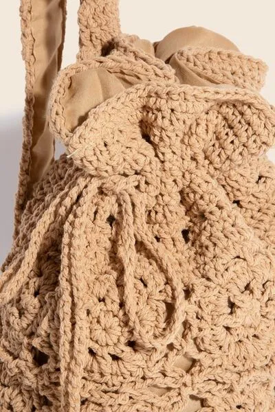 Fame Intricate Braided Single Strap Drawstring Bag sold by Charming Charlie product image thumbnail 4