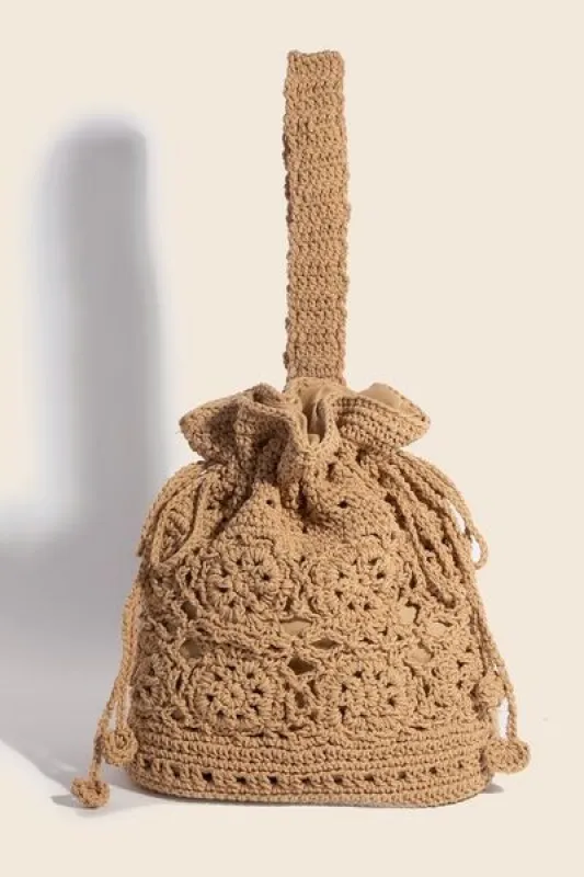 Fame Intricate Braided Single Strap Drawstring Bag sold by Charming Charlie