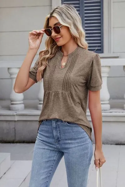 Notched Short Sleeve Top sold by Charming Charlie