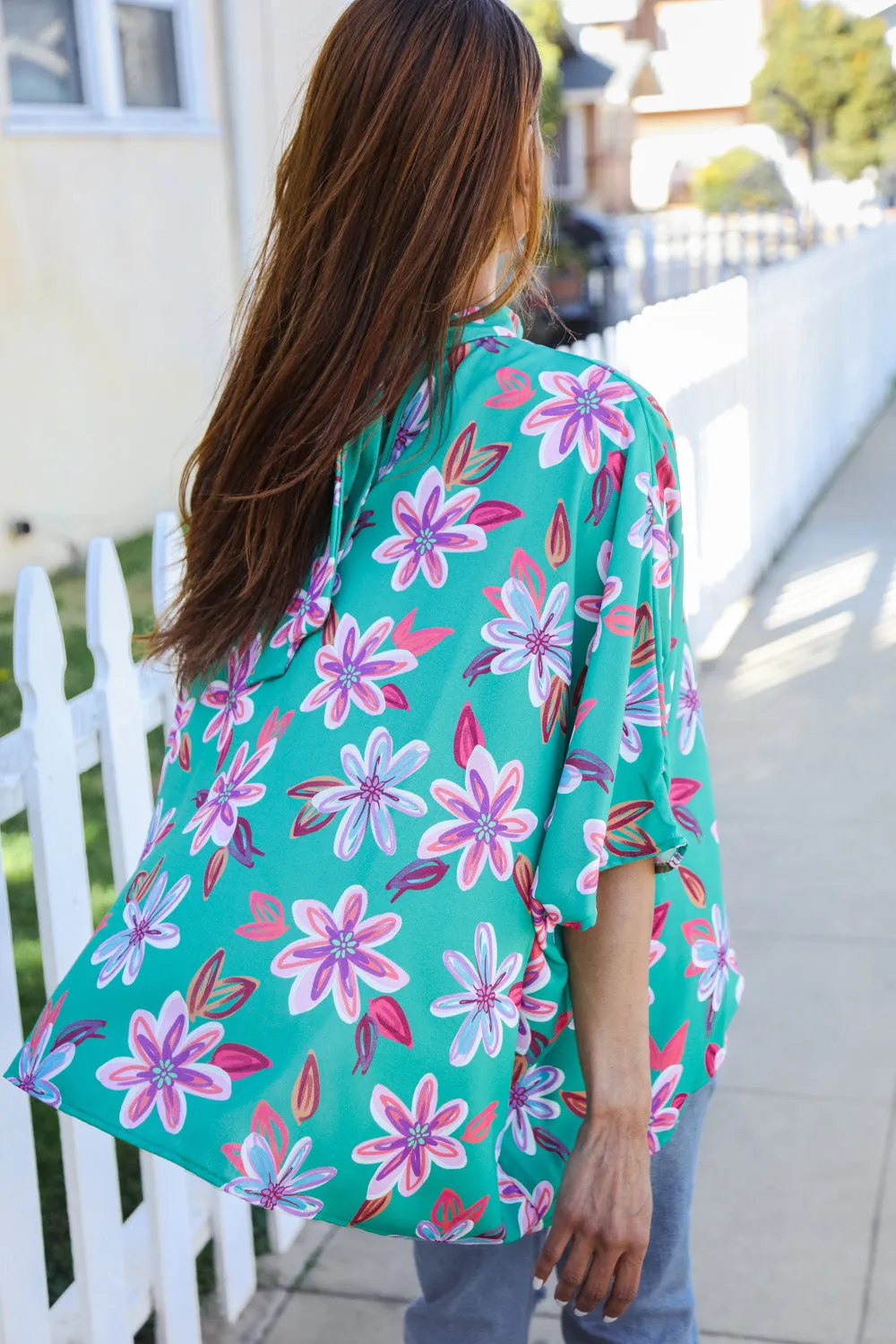 Vacay Vibes Green Floral Dolman Bat Sleeve Bow Blouse sold by Charming Charlie product image thumbnail 4
