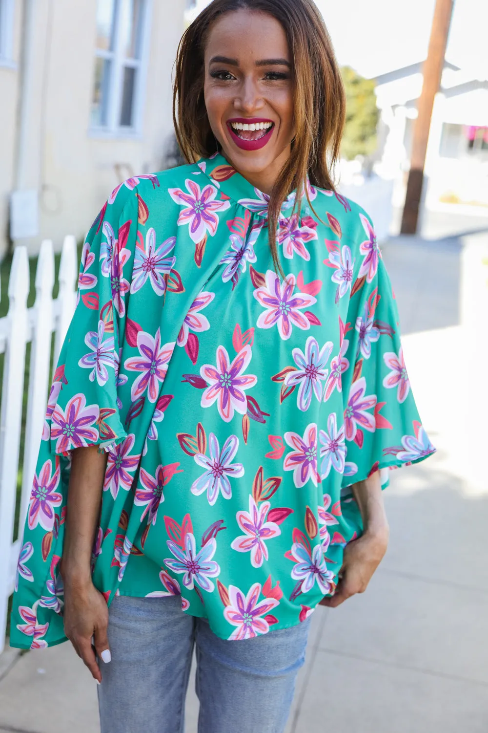 Vacay Vibes Green Floral Dolman Bat Sleeve Bow Blouse sold by Charming Charlie product image thumbnail 3
