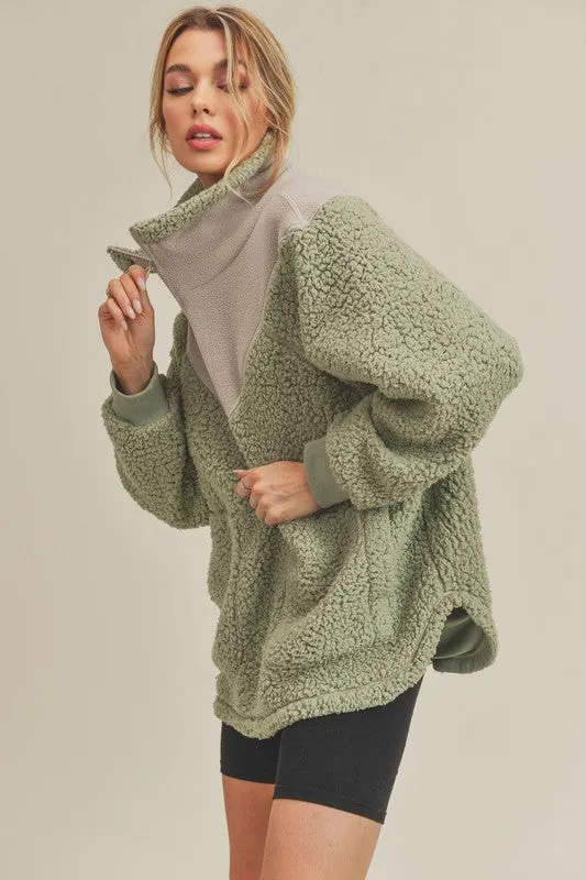 Aspen Pullover sold by Charming Charlie