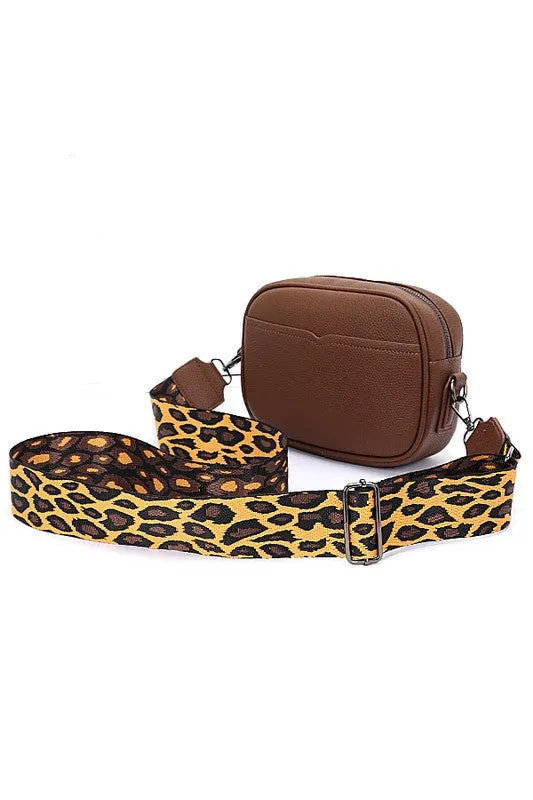 Guitar Strap Iconic Faux Leather Sling Bag sold by Charming Charlie