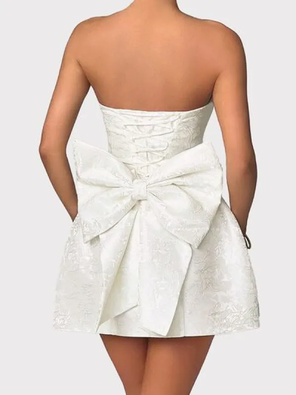 Lace-Up Sleeveless Satin Mini Dress with Bow sold by Charming Charlie