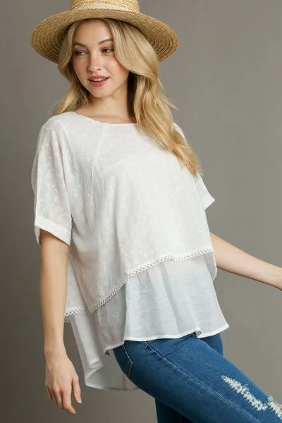 Umgee Full Size Eyelet Layered Short Sleeve Blouse Plus Size sold by Charming Charlie