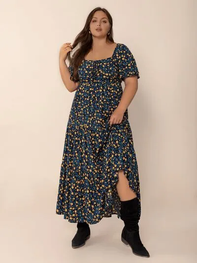 Plus Size Printed Short Sleeve Slit Tiered Maxi Dress sold by Charming Charlie