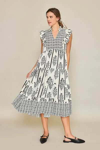 Umgee Full Size Boarder Print Midi Dress Plus Size sold by Charming Charlie