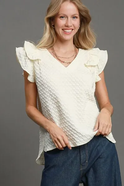 Umgee Full Size Textured Jacquard V-Neck Ruffle Cap Sleeve Blouse Plus Size sold by Charming Charlie