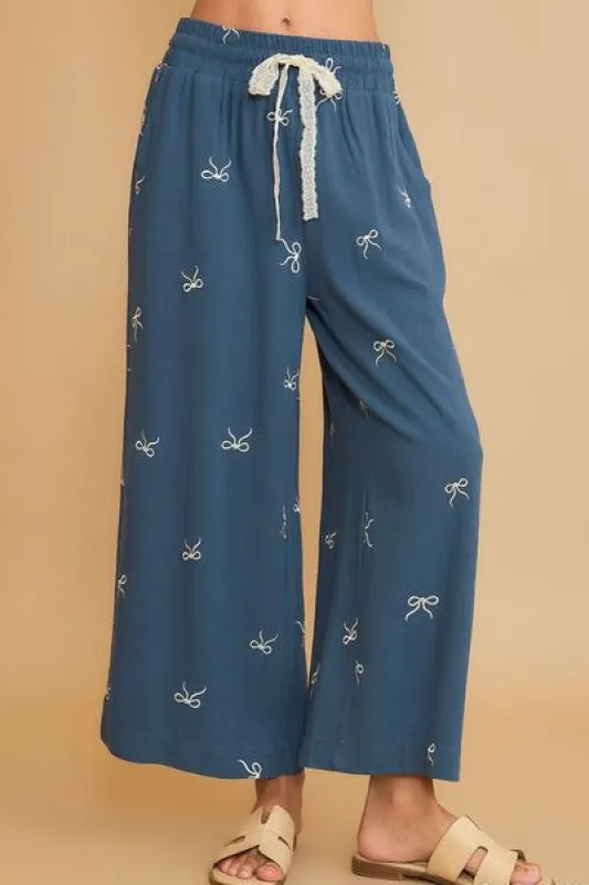 Umgee Full Size Lace Drawstring Embroidered Bow Wide Leg Pants Plus Size sold by Charming Charlie