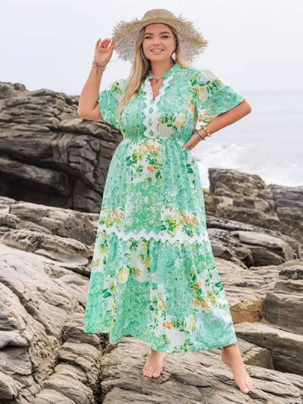 Plus Size Printed Notched Short Sleeve Maxi Dress sold by Charming Charlie