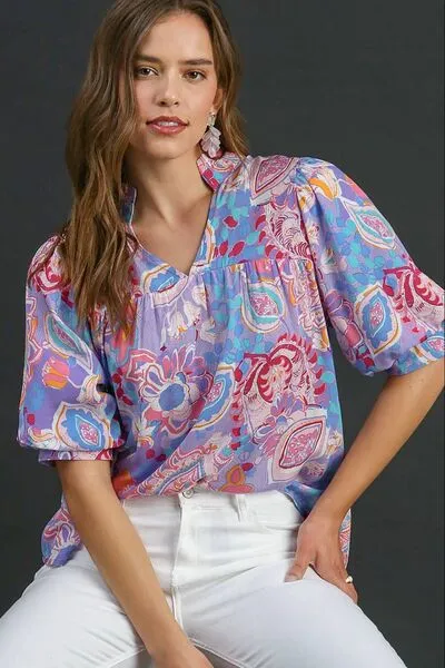 Umgee Full Size Mixed Print Notched Puff Sleeve Blouse Plus Size sold by Charming Charlie