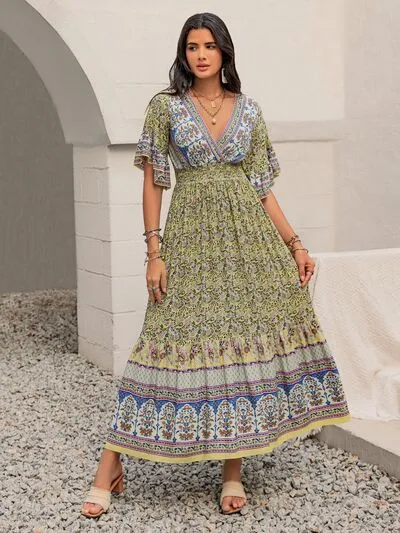 Ruched Printed Flounce Sleeve Maxi Dress sold by Charming Charlie