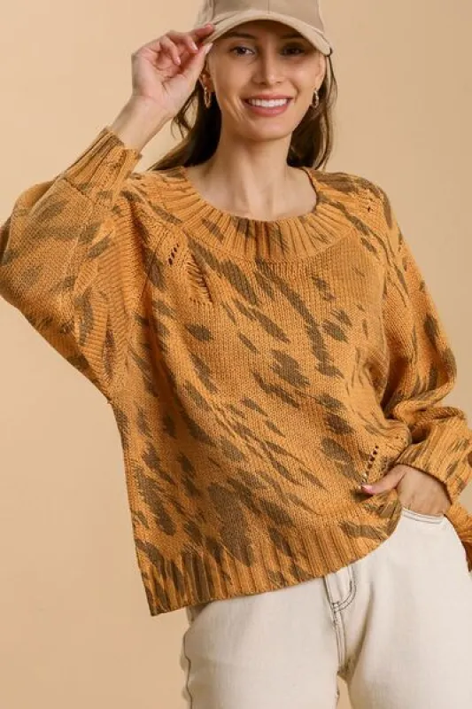 Umgee Full Size Animal Print Round Neck Distressed Detail Sweater Plus Size sold by Charming Charlie