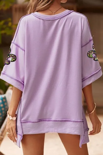 Mardi Gras Sequin Fleur De Lis Patched Exposed Seam Oversize Top sold by Charming Charlie product image thumbnail 3
