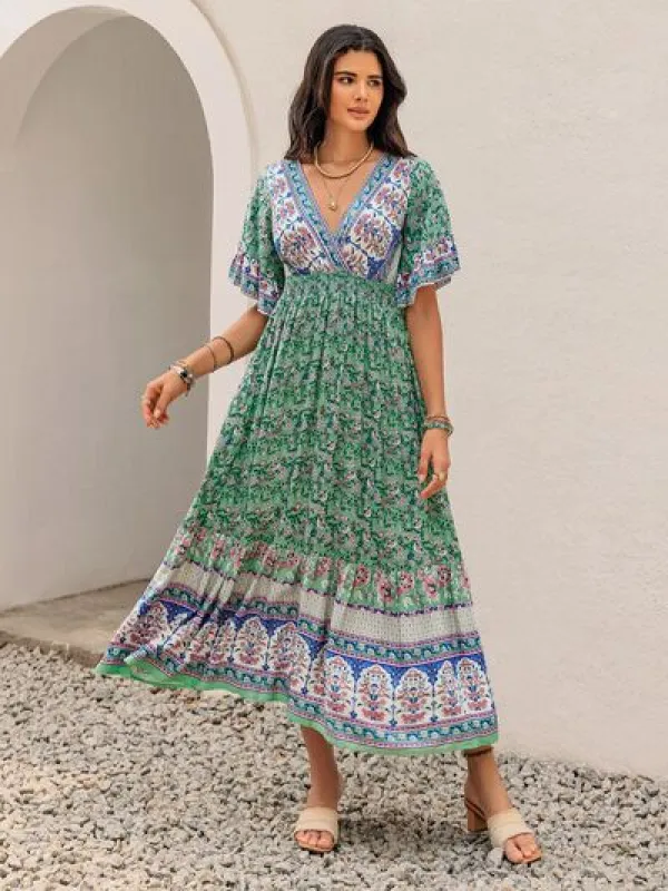 Ruched Printed Flounce Sleeve Midi Dress sold by Charming Charlie