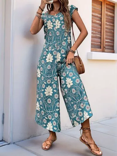Perfee Printed Round Neck Cap Sleeve Wide Leg Jumpsuit sold by Charming Charlie