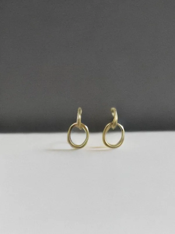 The SAK- Gold Double Loop Infinity Earring sold by Charming Charlie