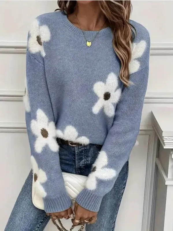 Fuzzy flower knit sweater sold by Charming Charlie