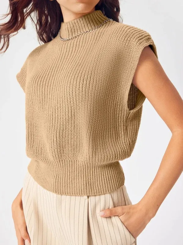 Cropped knit sleeveless sweater sold by Charming Charlie