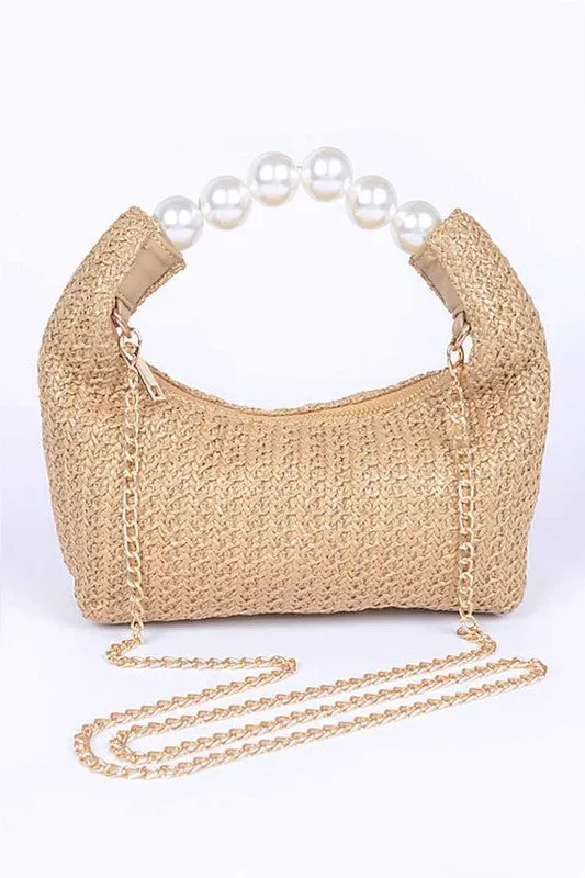 Pearl Handle Faux Straw Fashion Clutch sold by Charming Charlie