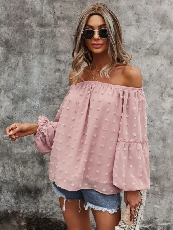 Off shoulder dotted top sold by Charming Charlie