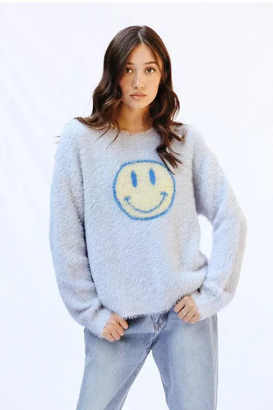 Fuzzy smile sweater sold by Charming Charlie