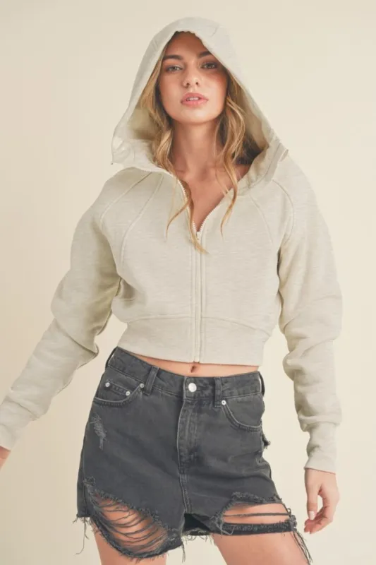 Aemi + Co Zip Up Raglan Sleeve Cropped Hoodie sold by Charming Charlie