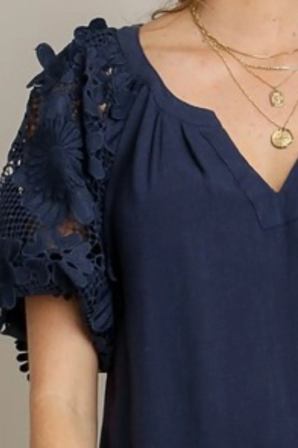 Umgee Full Size French Terry Boxy Cut Top with 3D Floral Sleeve Plus Size sold by Charming Charlie product image thumbnail 3