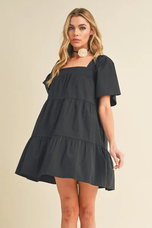 Aemi + Co Square Neck Half Sleeve Tiered Dress sold by Charming Charlie