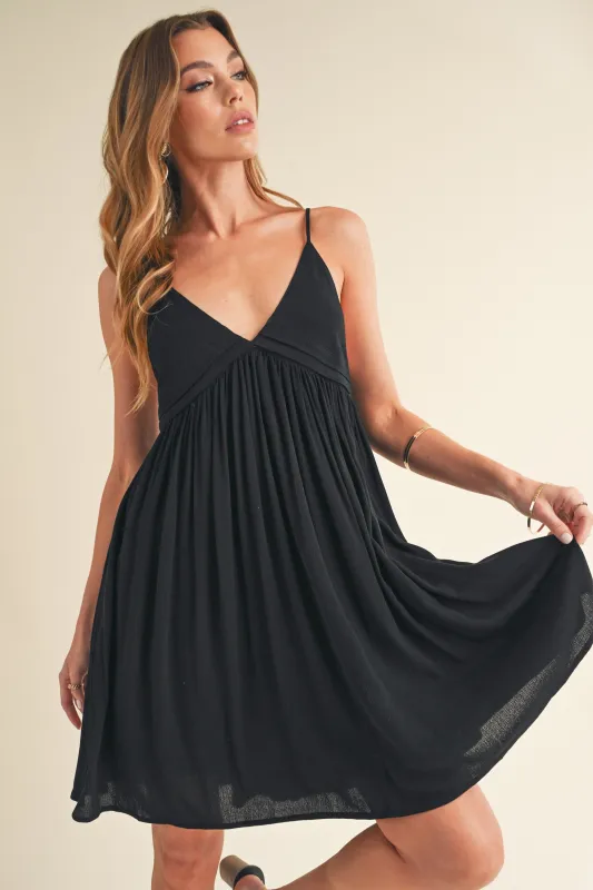 Aemi + Co Ruched Plunge Mini Cami Dress sold by Charming Charlie