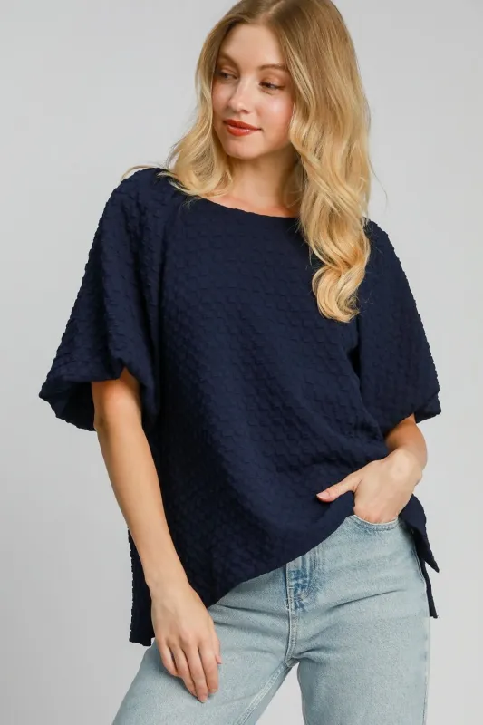 Umgee Full Size Boxy Cut Jacquard Round Neck Top with Side Slit Plus Size sold by Charming Charlie