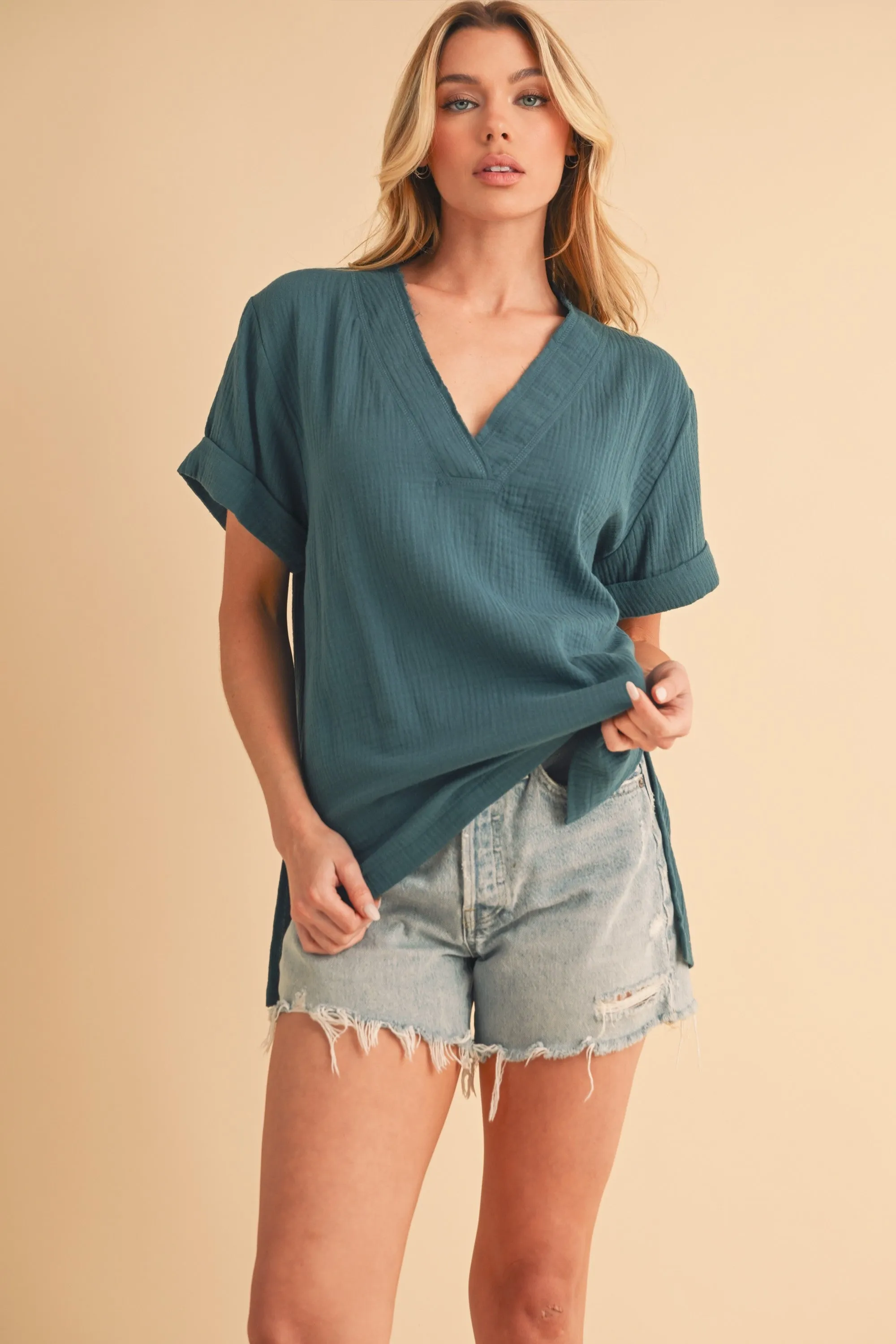 Aemi + Co Side Slit V-Neck Short Sleeve Blouse sold by Charming Charlie