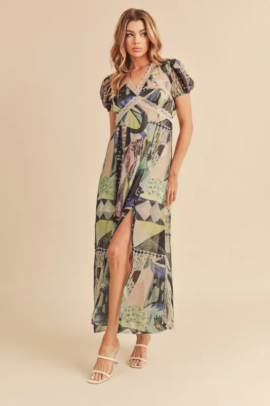 Aemi + Co Lace Detail Slit Geometric Print Short Sleeve Maxi Dress sold by Charming Charlie