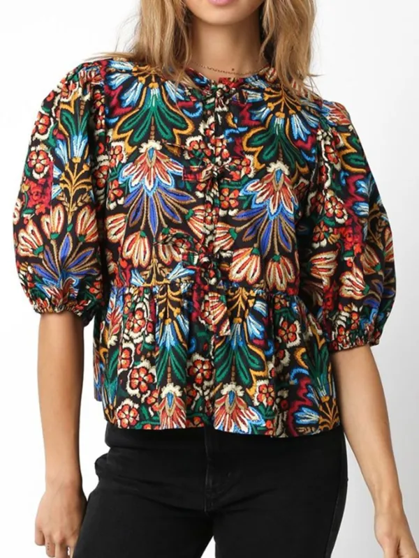 Tropical Print Puff Sleeve Knot Front Blouse sold by Charming Charlie
