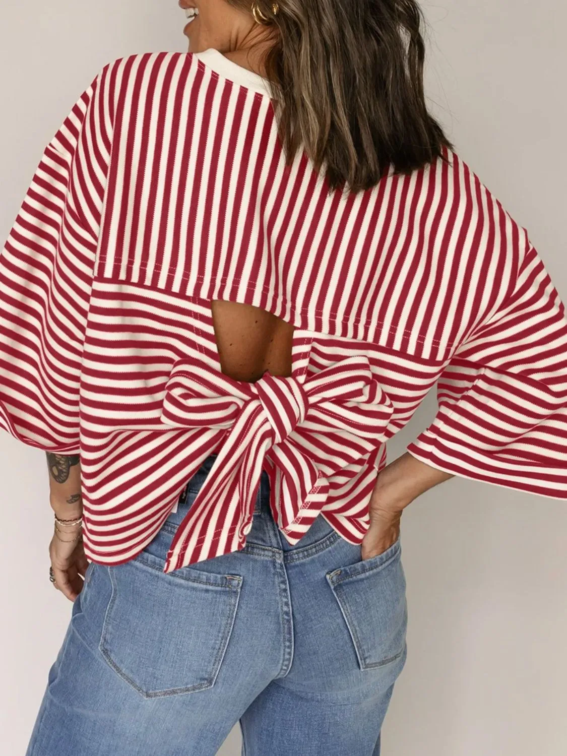 Stripe Bow Decor Cutout Drop Shoulder Top sold by Charming Charlie product image thumbnail 2