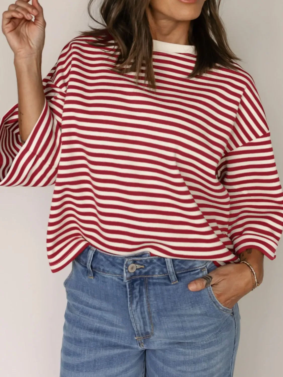 Stripe Bow Decor Cutout Drop Shoulder Top sold by Charming Charlie